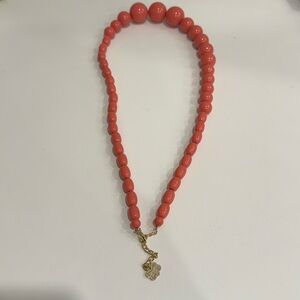 Plastic bead necklace with metal clasp
